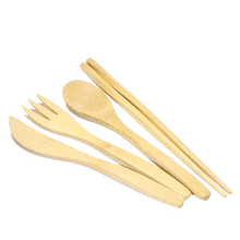 Load image into Gallery viewer, A light-colored wooden knife, fork, spoon and chopsticks lay beside each other.