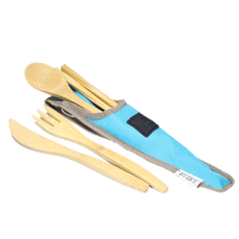 Load image into Gallery viewer, A wooden knife and fork lay beside a narrow blue bag holding a wooden spoon and wooden chopsticks. The utensil bag had a black Velcro strip and is lined with grey accent border.