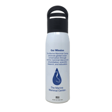 Load image into Gallery viewer, White reusable bottle with black cap and The Marine Mammal Center's logo in blue on back. Text reads "Our Mission: The Marine Mammal Center advances global ocean conservation through marine mammal rescue and rehabilitation, scientific research, and education."
