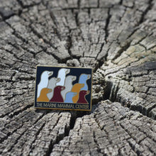 Load image into Gallery viewer, Decade pin sits on top of a tree stump.