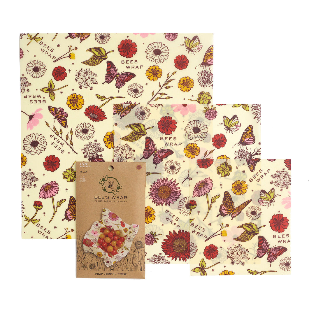 3 sheets of reusable plant-based vegan wraps with red, purple, yellow, and pink flowers and butterflies pattern.