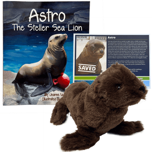 Small brown sea lion plush toy in front of paperback book titled "Astro The Steller Sea Lion" and symbolic adoption certificate with Steller sea lion Astro's photo and story.