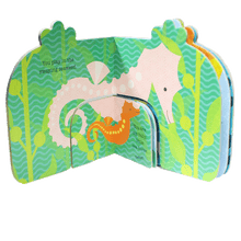 Load image into Gallery viewer, Open page of the &quot;You are My Baby - Ocean&quot;, depicting a mother and baby seahorse on a seaweed background with the words, &quot;You play in the swaying seaweed. You are my baby, little sea horse.&quot;
