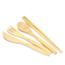 Load image into Gallery viewer, A light-colored wooden knife, fork, spoon and chopsticks lay beside each other.
