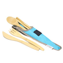 Load image into Gallery viewer, A wooden knife and fork lay beside a narrow blue bag holding a wooden spoon and wooden chopsticks.  The utensil bag had a black Velcro strip and is lined with grey accent border.
