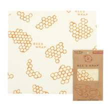 Load image into Gallery viewer, Square sheet of reusable wrap with honeycomb pattern and text &quot;Bees Wrap&quot; next to cardstock package.
