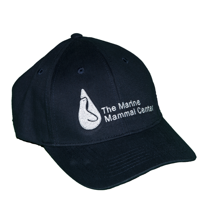 Navy blue baseball cap with Marine Mammal Center logo in white