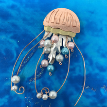 Load image into Gallery viewer, Copper metal pin in shape of sea jelly, with  pink, with, and blue beads.
