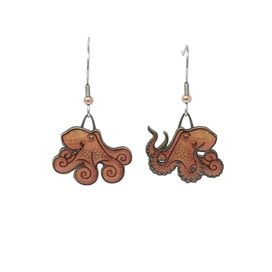 Orange earrings in shape of octopuses; octopus on right has three arms up, displaying suction cups. Copper bead at base of each ear wire.