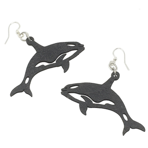 Two black relief-style wooden orca earrings on silver earring hooks.