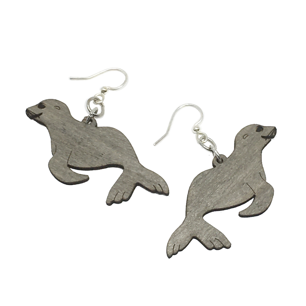 Two relief-style grey/brown sea lions with silver ear wires.