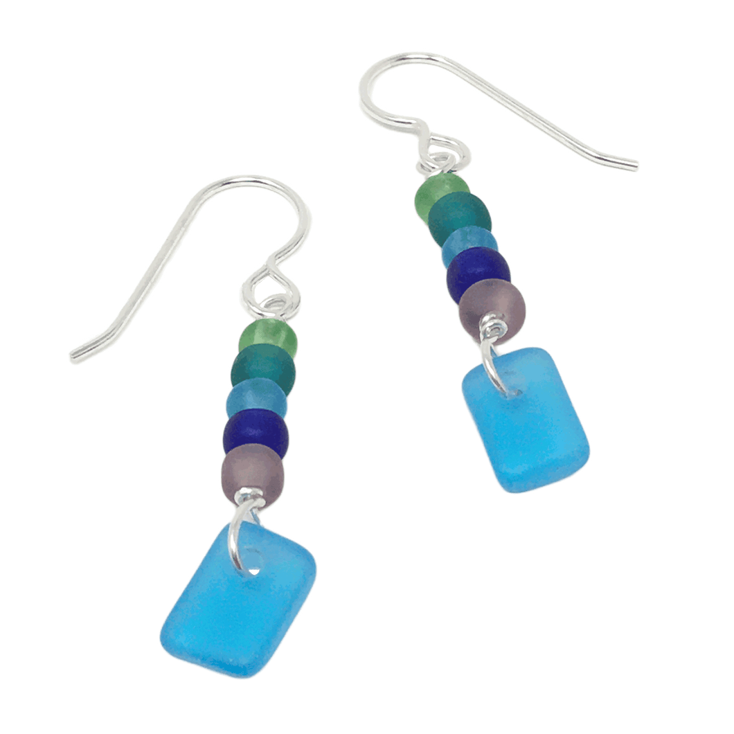Earrings consisting of a string of five small round beads (green, sea green, turquoise, cobalt, and lilac) accented by a larger turquoise rectangular charm.