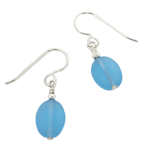 Two light blue drop earrings attached to silver wire hooks.