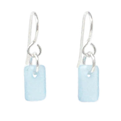 A set of dangly rectangular seaglass earrings, turquoise in color, on silver earwires.