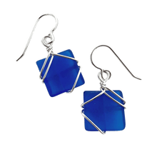 Load image into Gallery viewer, Dangly earrings with square cobalt blue glass piece encased in silver wiring
