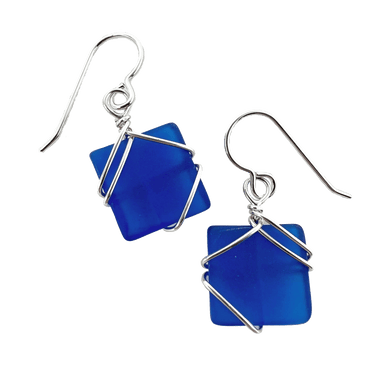 Dangly earrings with square cobalt blue glass piece encased in silver wiring
