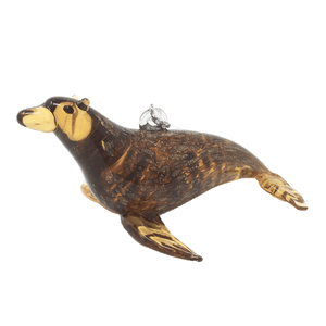 Glass sea lion ornament, tan and brown with gold glitter.