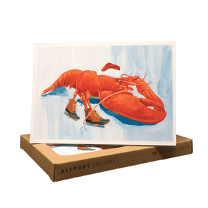 Holiday card with red-orange lobster wearing Santa hat and brown dock boots.