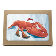 Box of holiday cards with lobster wearing Santa hat and boots on cover.