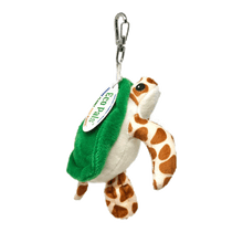 Load image into Gallery viewer, Sea turtle key chain with spotted light tan with darker tan spots along the body and green shell attached to a silver clip. White product tag hangs on the clip and reads &quot;EcoPals&quot;.
