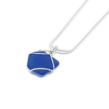 Load image into Gallery viewer, Cobalt blue rectangular glass pendant encased in silver wiring, on silver snake chain.

