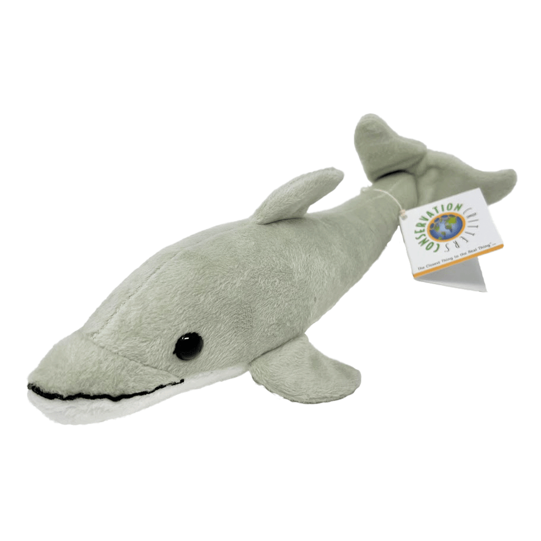 Grey plush dolphin with white tag that reads 