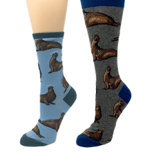Load image into Gallery viewer, socks with elephant seal design, shown on foot mannequin in two sizes
