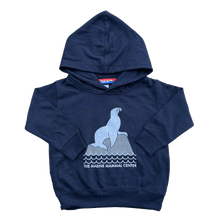 Load image into Gallery viewer, Toddler hooded sweatshirt in navy with an image of a sea lion on a rock and the words &quot;The Marine Mammal Center&quot;.
