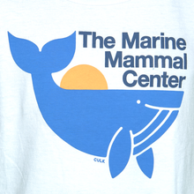 Load image into Gallery viewer, Closeup of tank top design: blue whale in front of rising sun, with text &quot;The Marine Mammal Center&quot; above and brand name &quot;CULK&quot; in small letters below whale image
