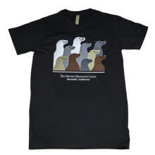 Load image into Gallery viewer, Black t-shirt with design of ten sea lion profiles in brown, gray, tan, and white and text &quot;The Marine Mammal Center Sausalito, California&quot; underneath
