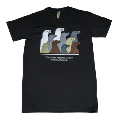 Black t-shirt with design of ten sea lion profiles in brown, gray, tan, and white and text 