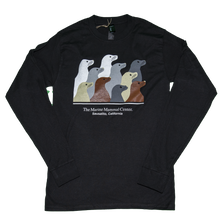 Load image into Gallery viewer, Black long-sleeve t-shirt featuring design with 10 sea lion profiles in white, gray, tan, and brown on front. Text &quot;The Marine Mammal Center Sausalito, California&quot; beneath image.
