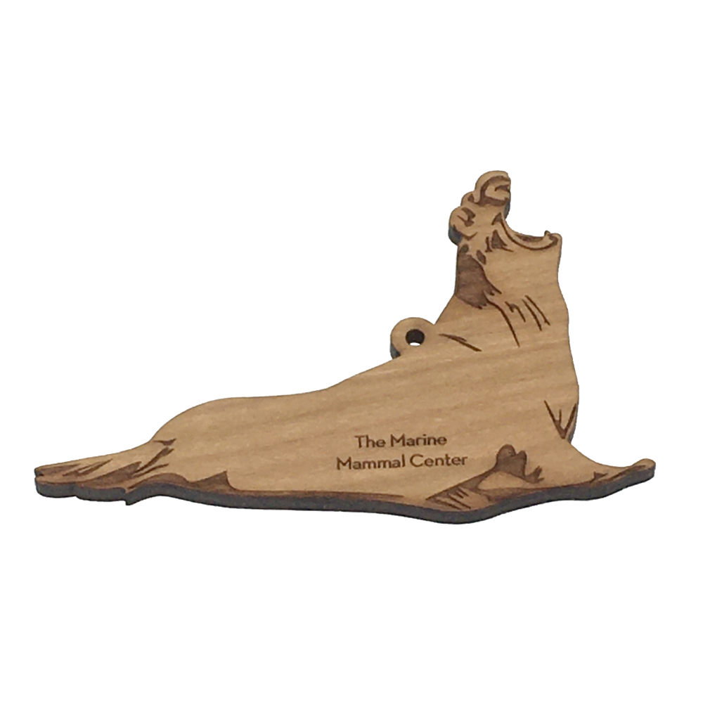 2D laser-cut wood elephant seal ornament with The Marine Mammal Center engraved.