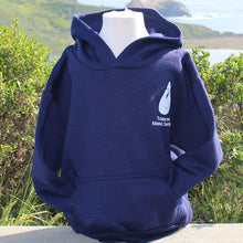 Load image into Gallery viewer, Navy blue youth hoodie with white TMMC logo on the left side of the chest.  Hoodie is on a child mannequin situated in front of a coastal background.
